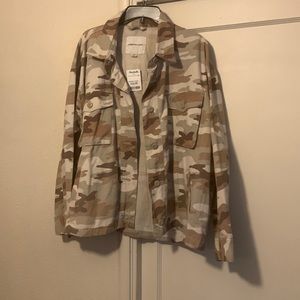 Lightweight Jean jacket. Brand New, never worn.